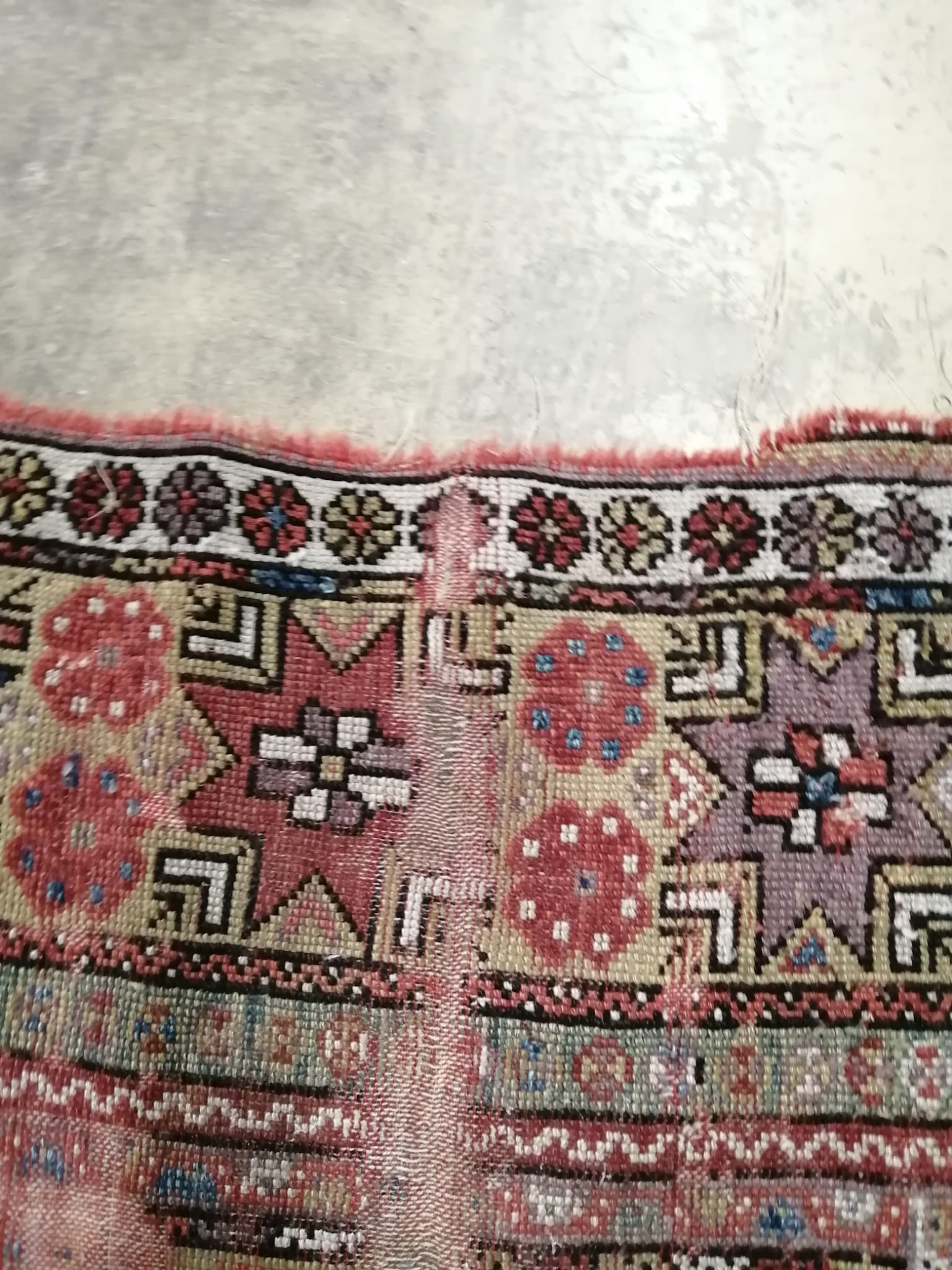 An antique Turkish Melas rug, 128 x 107cm